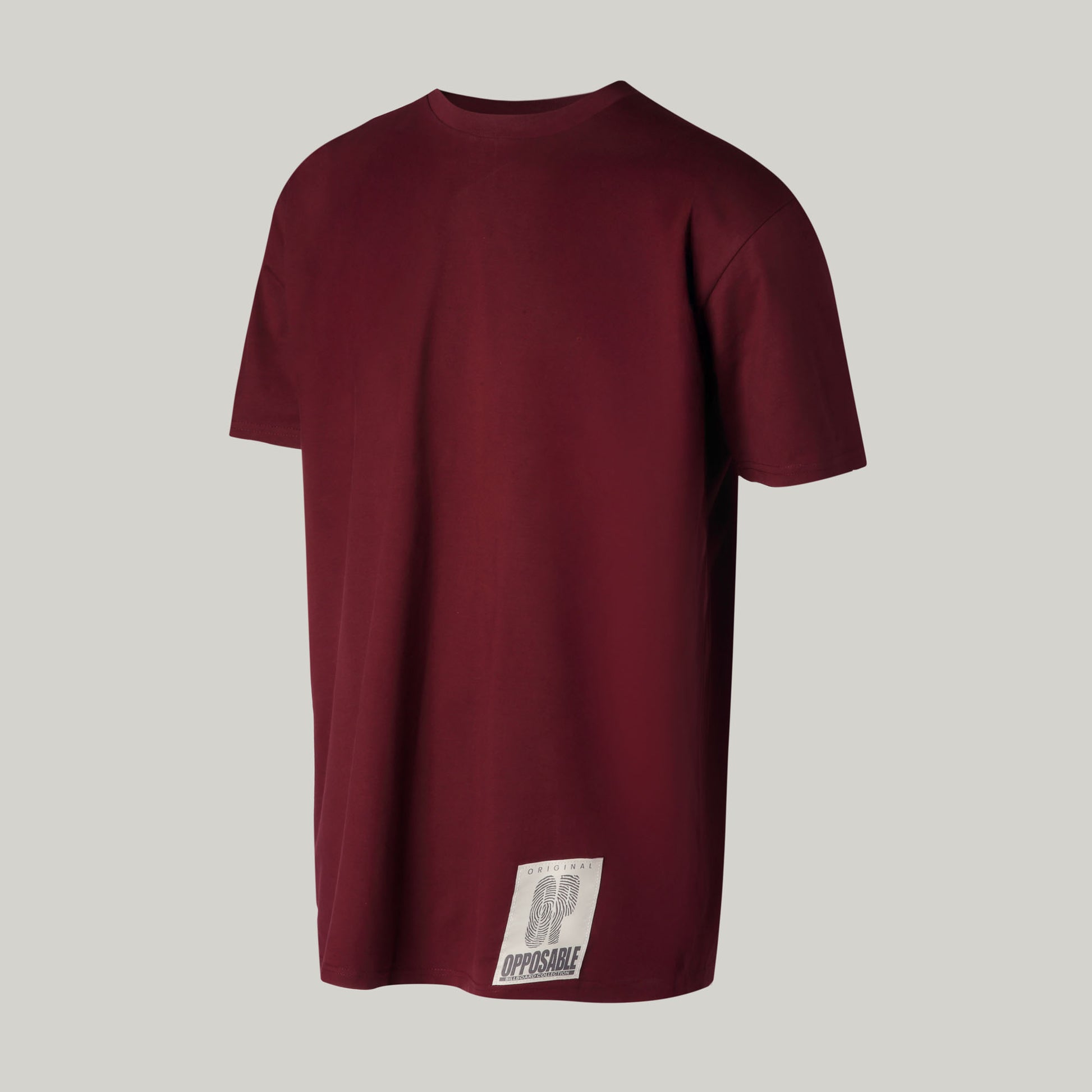 Opposable - The OP Billboard Tee - Sangria. Opposable OP logo T-Shirt  in maroon. 3/4 angle.