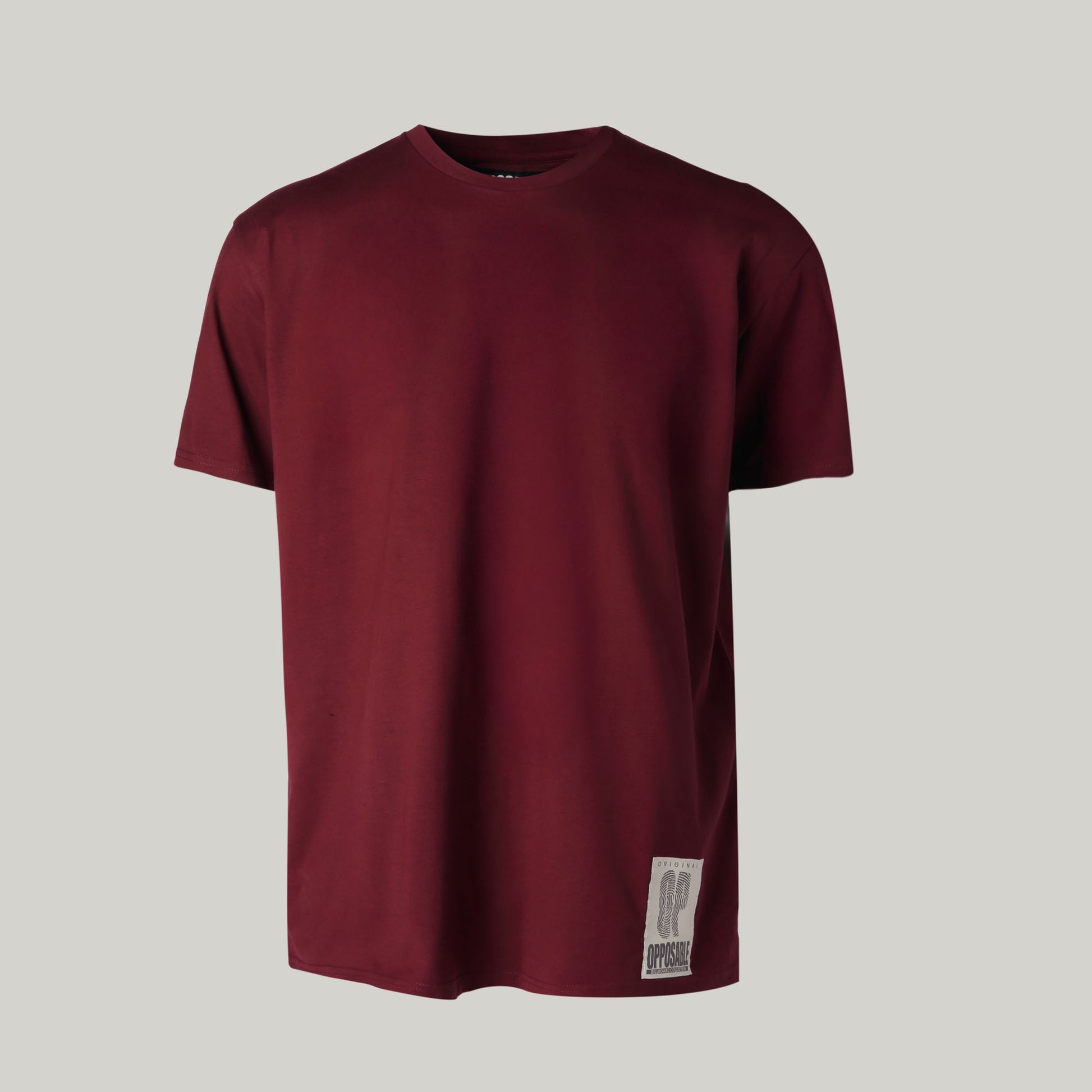 Opposable - The OP Billboard Tee - Sangria. Opposable OP logo T-Shirt  in maroon. Front angle.
